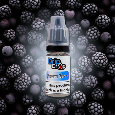 Bottle of Drip Drop Frozen Berry vape juice with frozen berries in the background